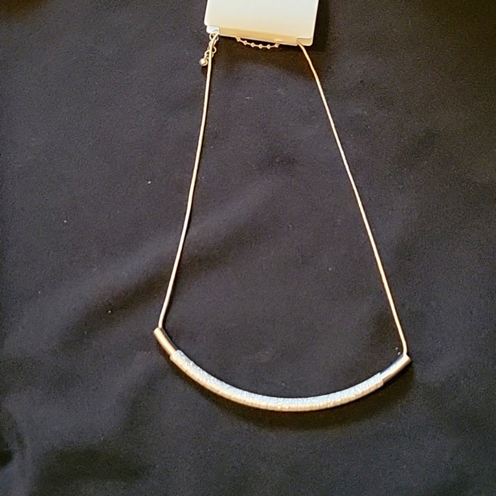 Brand new necklace.  Curved bar